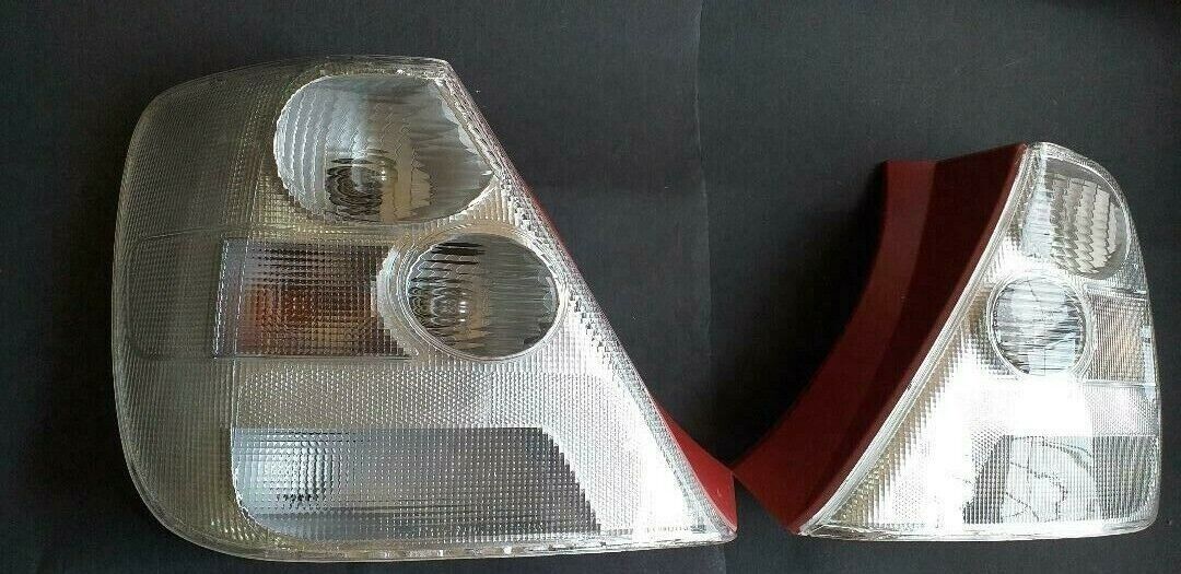 Clear tail light lenses for 2002-2005 Honda Civic Si hatchback by NTXGlow, showing the transparent lens design on the vehicle.
