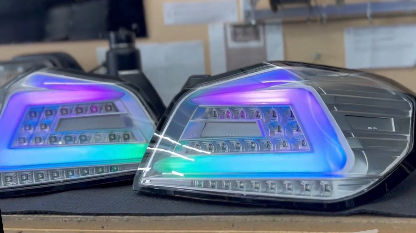 NTXGlow RGB color-shifting tail lights for 2015-2021 Subaru WRX/STI with clear lens and dynamic lighting features.