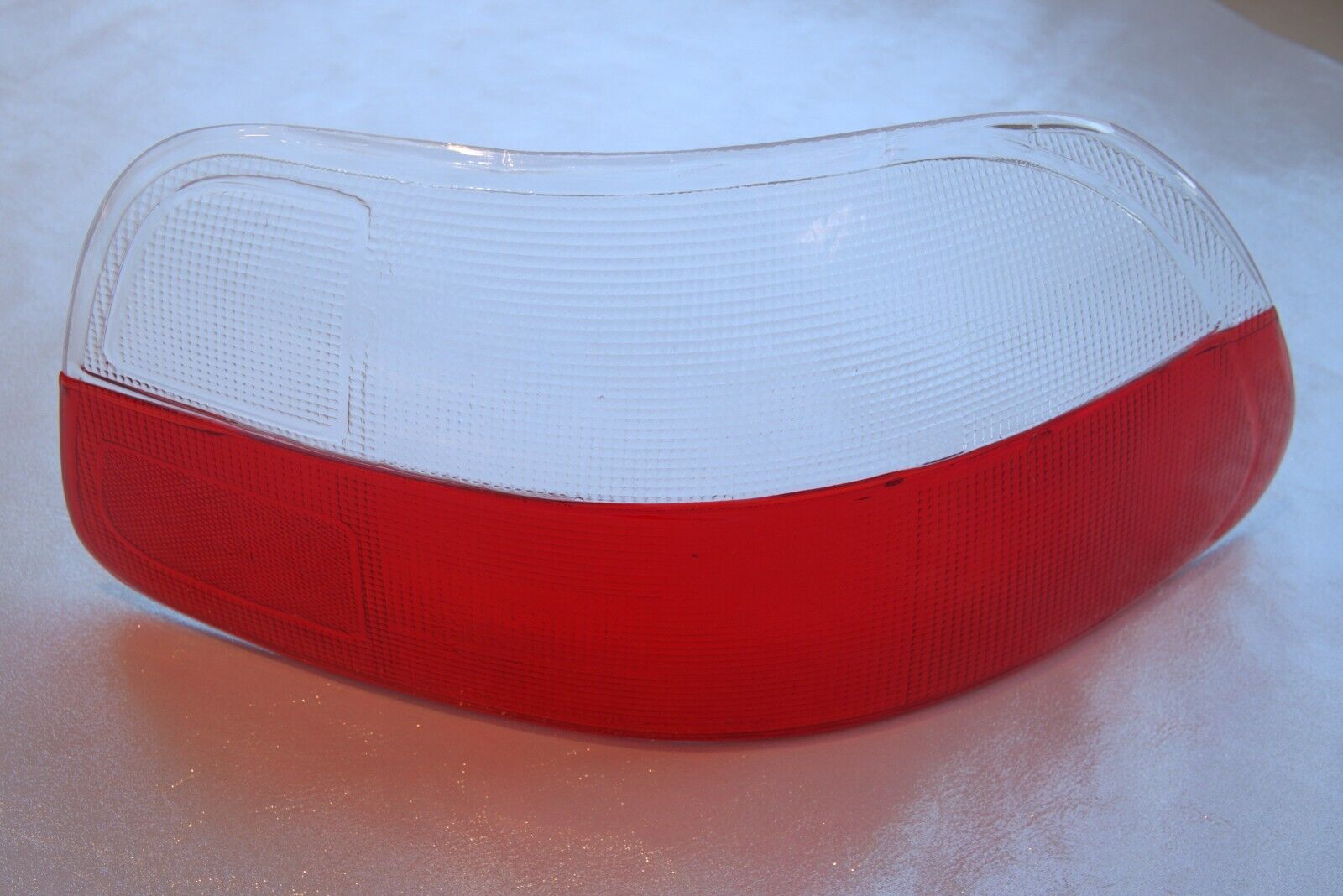 Redclear tail light lenses for 1993-1997 Honda Del Sol by NTXGlow, showing the red and clear sections of the lens assembly.