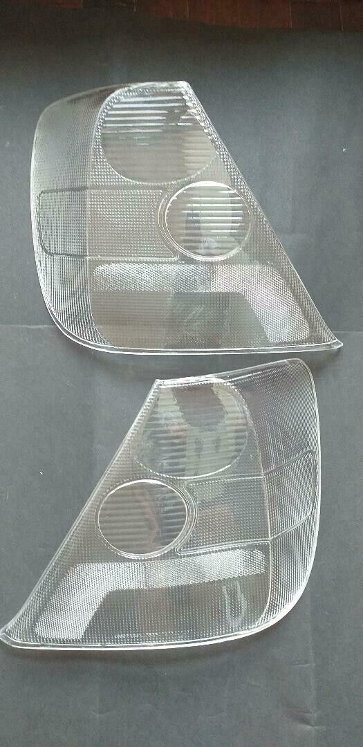 Clear tail light lenses for 2002-2005 Honda Civic Si hatchback, NTXGlow brand, showing close-up of lens details and transparency.