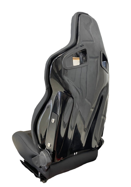 Black leather and suede racing seat with double stripe from SPDZ1 GT1 by Speedzone Performance LLC, showcasing ergonomic design and branding.