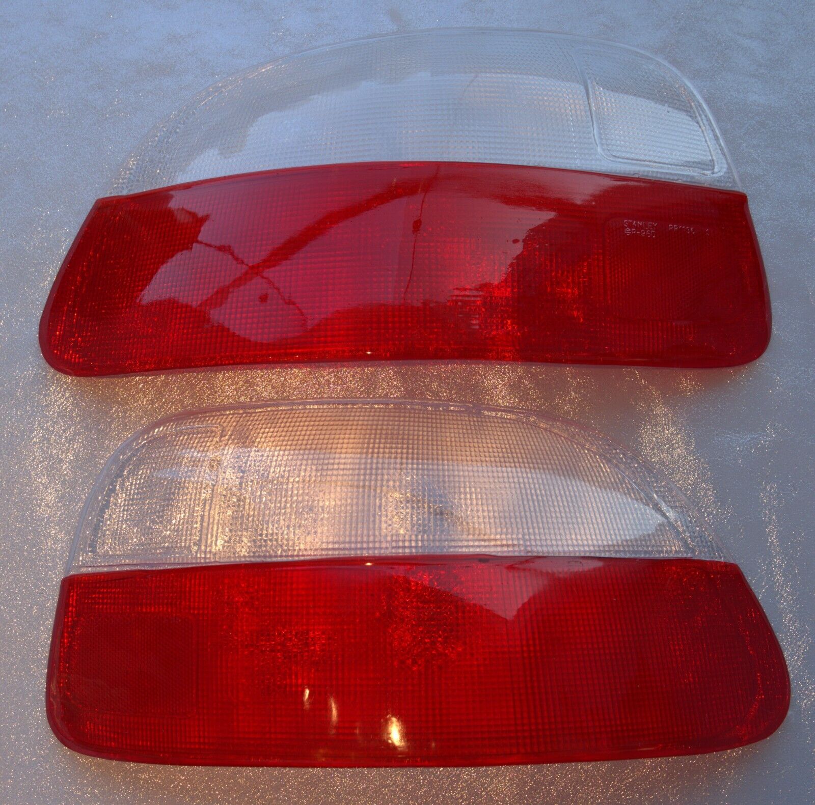 Red clear tail light lenses for 1993-1997 Honda Del Sol by NTXGlow, showing the set of two lens covers with reflective surfaces.