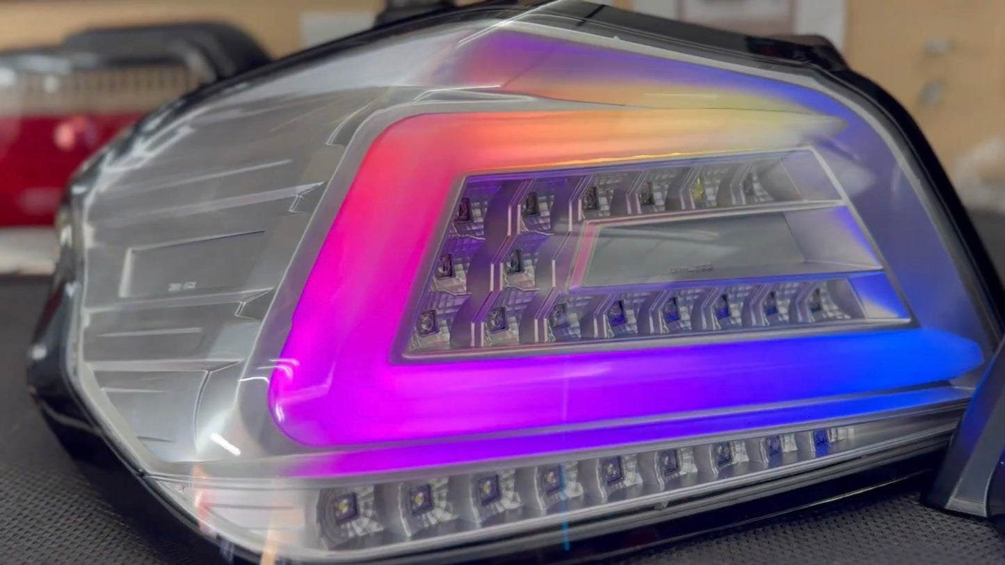 NTXGlow clear RGB color-shifting tail lights for 2015-2021 Subaru WRX and STI models, featuring vibrant LED lighting and sleek design.