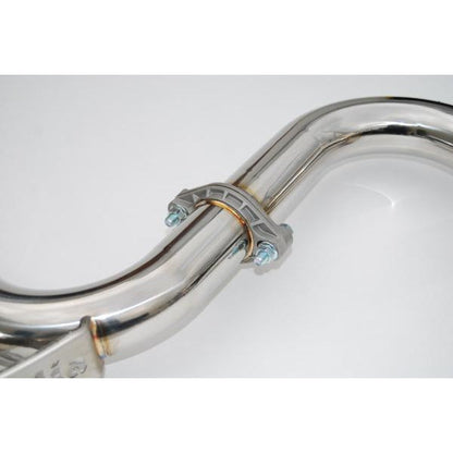 Invidia N1 dual cat back exhaust system with burnt titanium tips on a Subaru WRX STI sedan, showcasing the sleek exhaust design.