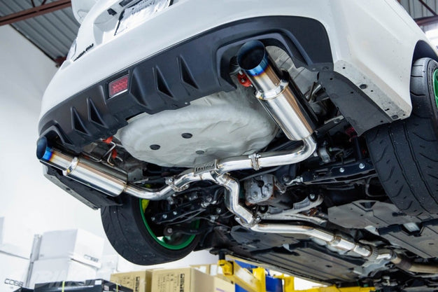 Invidia N1 dual cat back exhaust system with titanium tips installed on a 2015-2021 Subaru WRX/STI or 2014-2017 Forester XT.