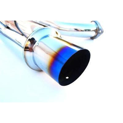 Invidia N1 titanium tip cat back exhaust system on a Subaru WRX and STI sedan, showing polished titanium tips and exhaust piping.