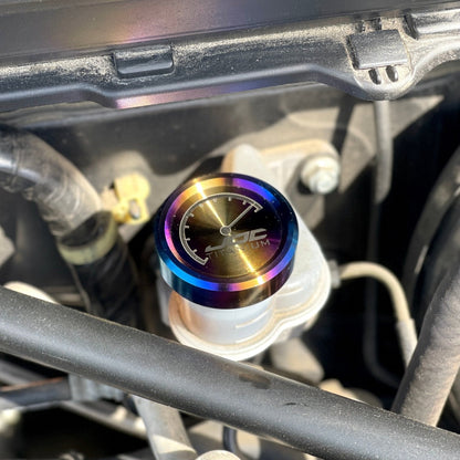 JDC Titanium clutch fluid reservoir cap cover for Subaru BRZ, FR-S, 86, and other models, showcasing a sleek metallic finish.
