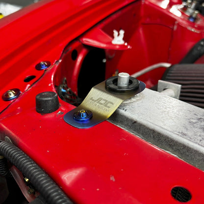 JDC Titanium Radiator Stay Bracket for Honda S2000, EK, EM, and EJ models, made of durable titanium for radiator support.