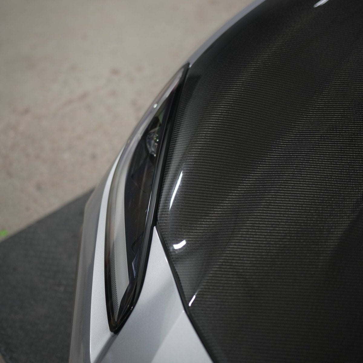 JDMuscle Tanso STI-style carbon fiber hood for 2022+ Subaru BRZ and Toyota GR86