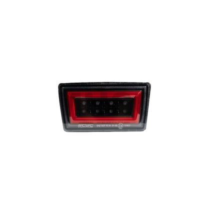 JDMuscle F1 Style Rear Fog and Brake Light for 2015-2021 Subaru WRX and STI, black base with clear lens, auxiliary lighting.