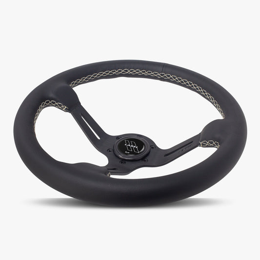 Black leather steering wheel with black spoke and white stitching from Speedzone Performance LLC, The Le Mans model.