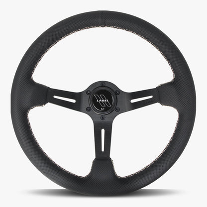 Black perforated leather steering wheel with white stitching and black spoke, designed for performance cars by Speedzone Performance LLC.