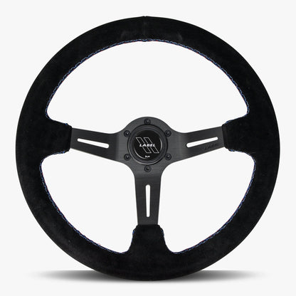 Black Alcantara suede steering wheel with black spoke and Bavarian stitch by Speedzone Performance LLC, The Le Mans model.