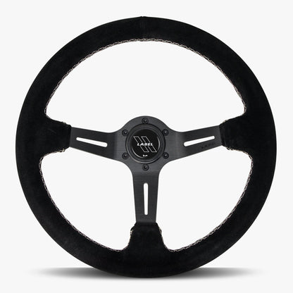 Black Alcantara suede steering wheel with black spoke and white stitching by Speedzone Performance LLC, The Le Mans model.