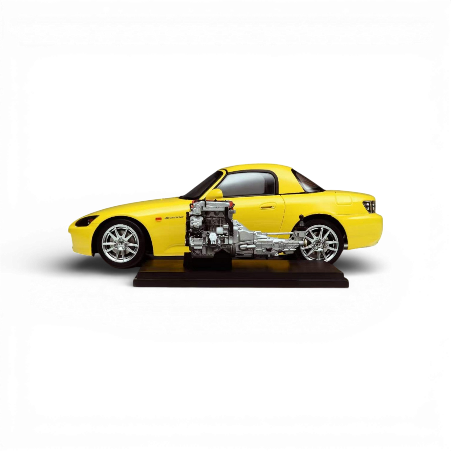 Yellow Honda S2000 AP2 diecast model in 1:18 scale by Motorhelix, detailed replica with realistic features.