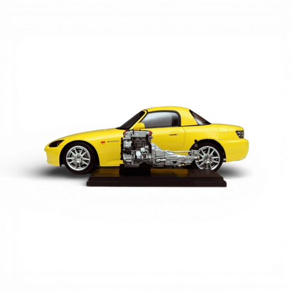Yellow Honda S2000 AP2 diecast model in 1:18 scale by Motorhelix, detailed replica with realistic features.