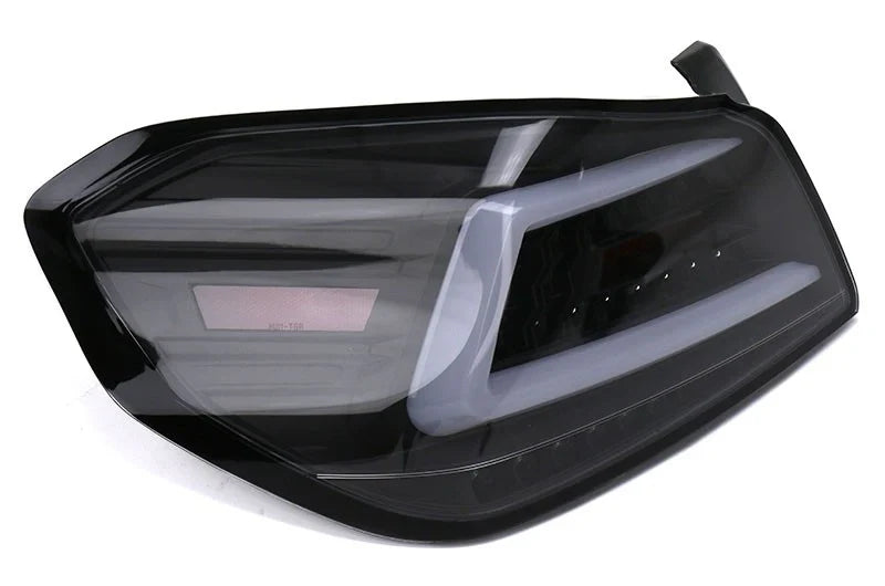 NTXGlow Spec-D LED tail lights with black housing for 2015-2021 Subaru WRX and STI, showcasing sleek design and bright illumination.