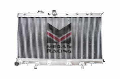 FR SPORT Megan Racing 2-Row Aluminum Radiator for 2002-2007 Subaru WRX/STI, shown installed in engine bay.