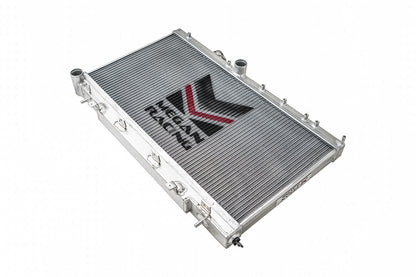FR SPORT Megan Racing 2-Row Aluminum Radiator for 2002-2007 Subaru WRX/STI, front view showing sleek aluminum core