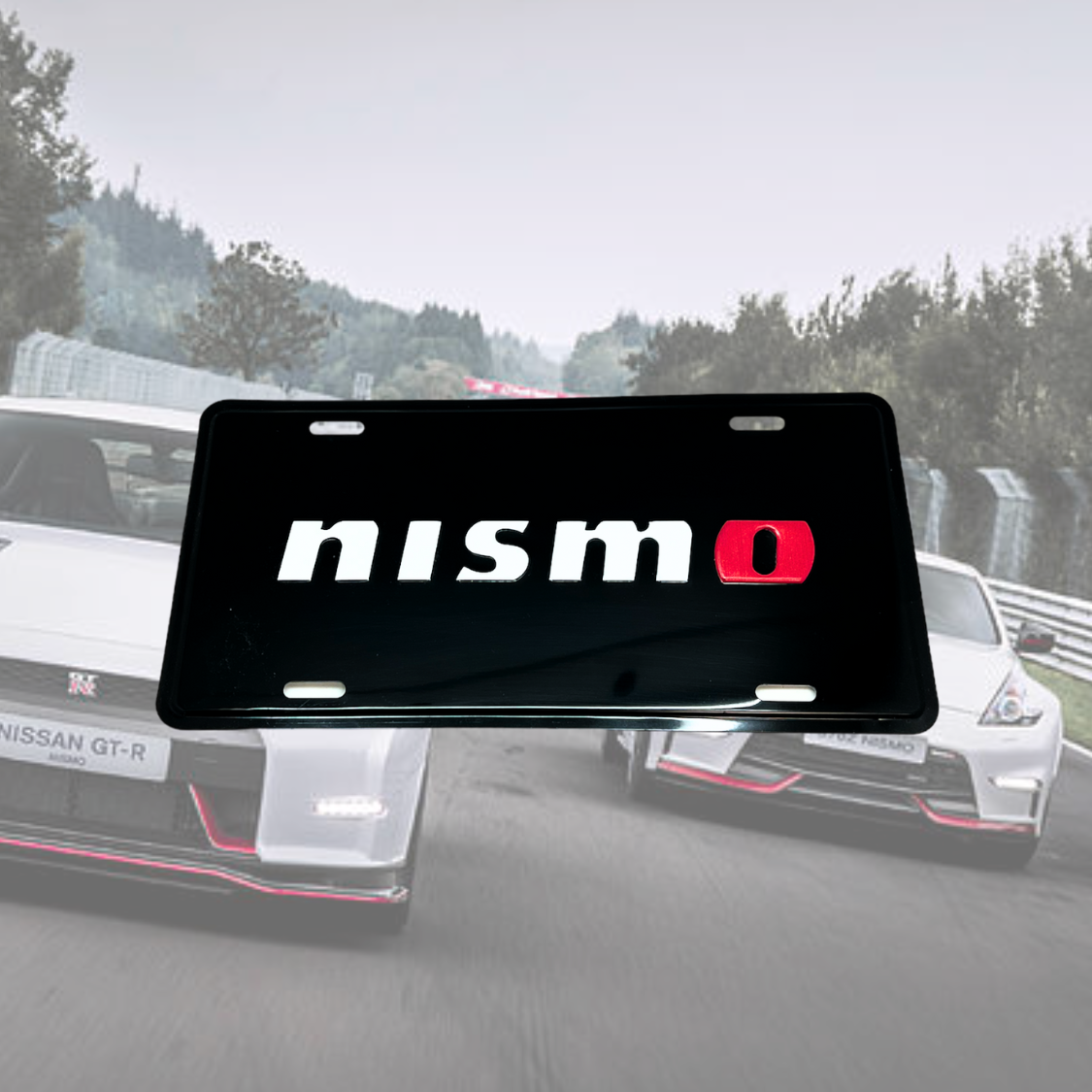 Illumaesthetic Nissan/Nismo dealer license plates with bold branding and clear Nismo logo on a sleek license plate design.
