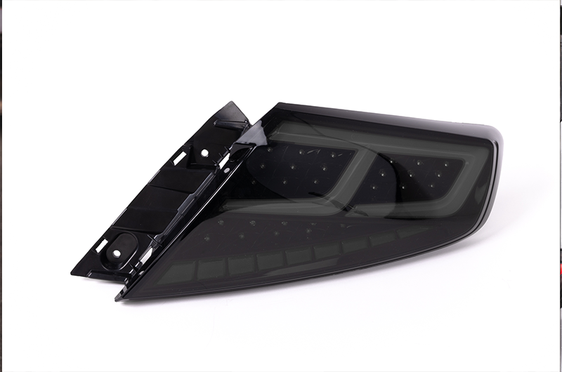 OLM Spec-AR LED taillights for 2022+ Subaru WRX, smoke lens with black base and white bar, automotive tail lights.