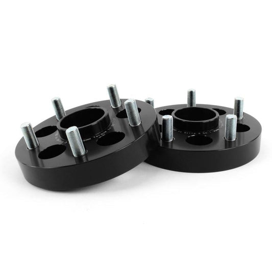 Black Perrin 25mm wheel adapters for Subaru 5x100 to 5x114.3, compatible with WRX, BRZ, Crosstrek, and Forester models.