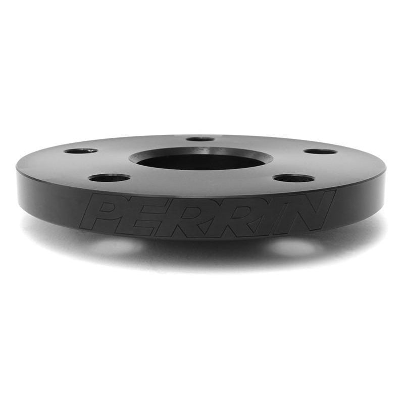 Perrin 15mm wheel spacers for Subaru WRX, STI, Outback, Legacy, and Forester, JDMuscle brand, showing pair of black spacers.