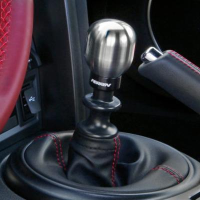 JDMuscle Perrin barrel style shift knob for Subaru WRX, Crosstrek, Legacy manual cars, featuring a sleek silver finish and ergonomic design.