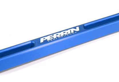 Blue PERRIN battery tie down for Subaru WRX, STI, BRZ, and other compatible models
