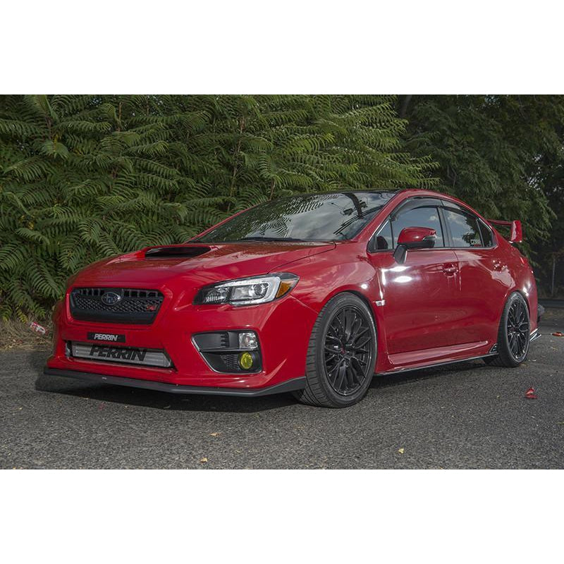 PERRIN front mount intercooler with black core and beam, designed for 2015-2021 Subaru WRX and STI performance upgrades.