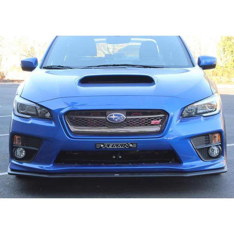 PERRIN Hella horn bracket installed on a 2015-2021 Subaru WRX/STI, showcasing the durable mounting for performance horns.