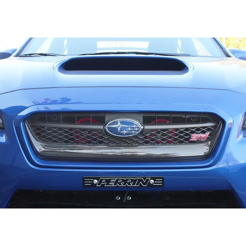 PERRIN Hella horn bracket for Subaru 2015-2021 WRX/STI, mounting accessory for performance horns, installed on engine bay.