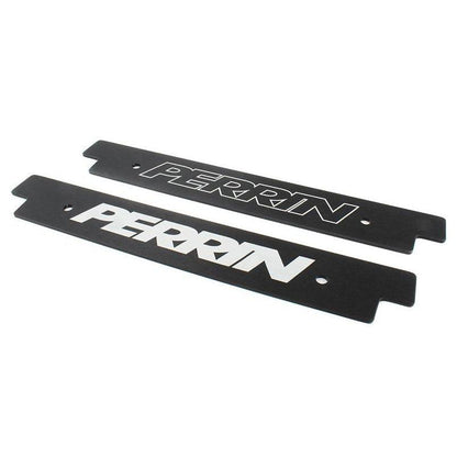 Reversible black PERRIN license plate delete for 2018-2021 Subaru WRX/STI, mounted on vehicle with clean design.