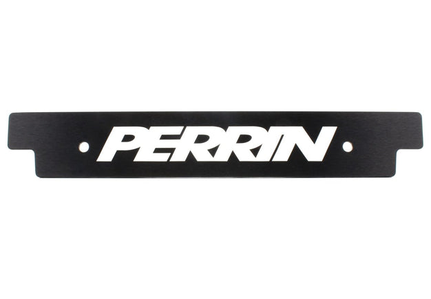 Reversible black license plate delete for 2018-2021 Subaru WRX and STI, JDMuscle brand, mounted on vehicle front bumper.