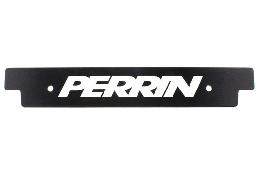 Reversible black license plate delete for 2018-2021 Subaru WRX and STI, JDMuscle brand, mounted on vehicle front bumper.
