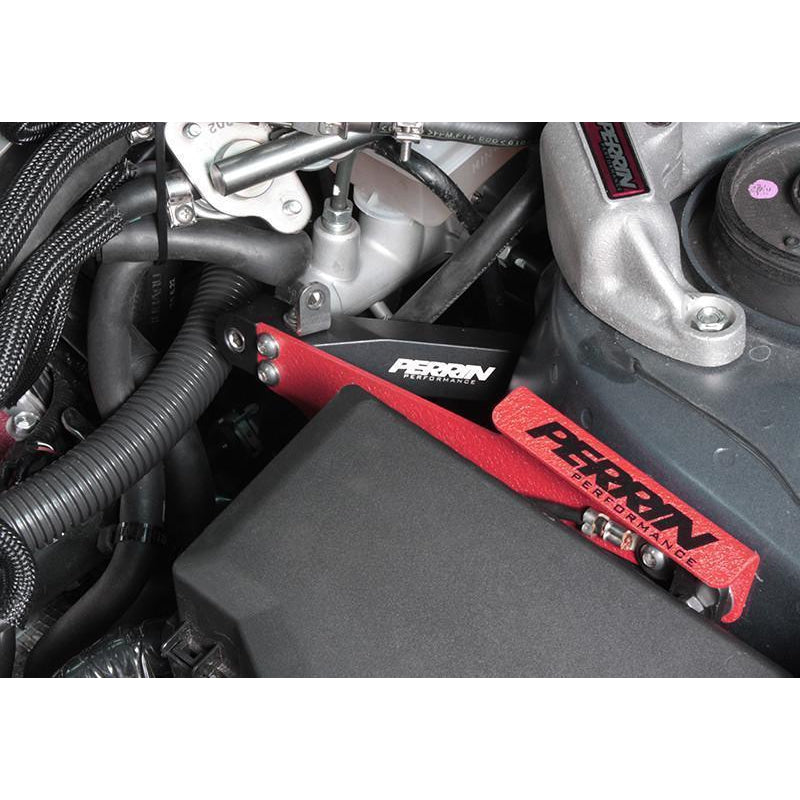 JDMuscle Perrin master cylinder bracket for Subaru WRX 2008-2014, mounted on the engine bay with black finish and secure fittings.