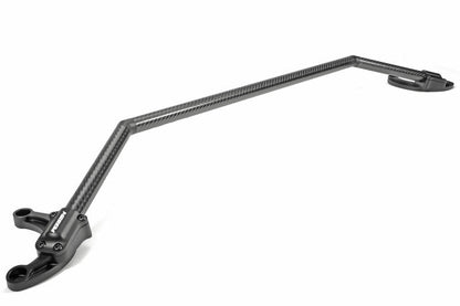 Perrin universal carbon fiber strut brace with billet feet, performance car suspension upgrade, installed in engine bay