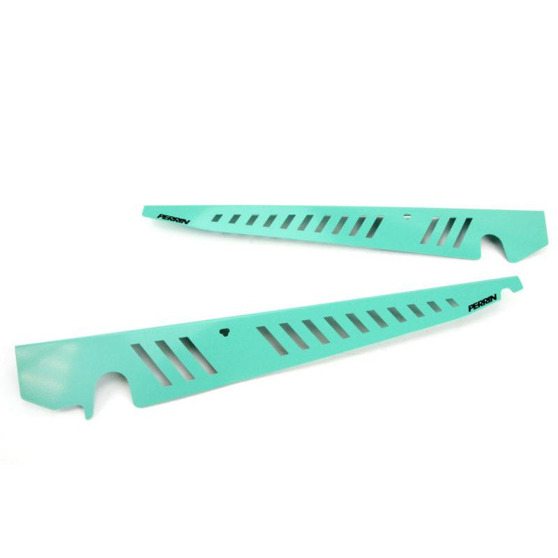 PERRIN Performance teal Fender Shrouds for 2015-2021 WRX/STI, front view showing sleek design and fitment details.