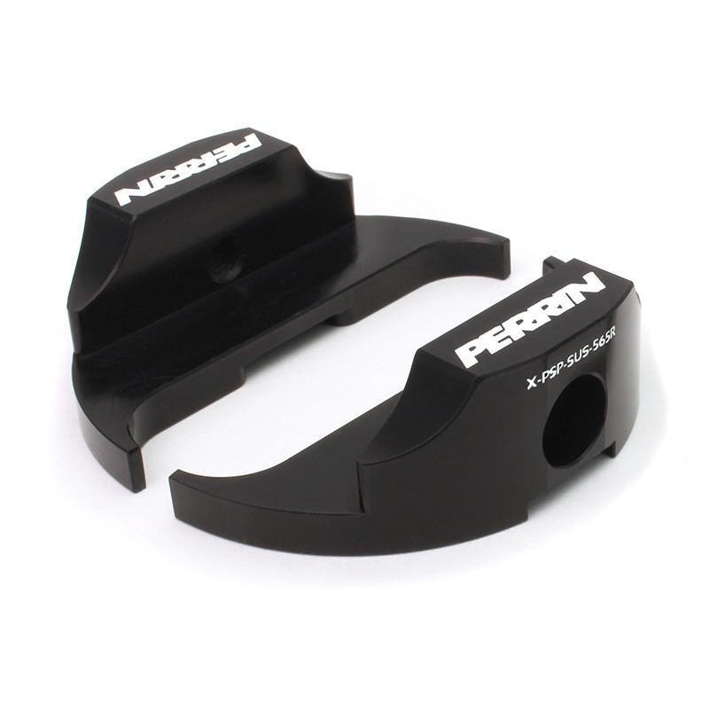 PERRIN Steering Dampener Lockdown Kit with Subaru WRX and Legacy GT steering rack bushings, black metal components, and mounting hardware.