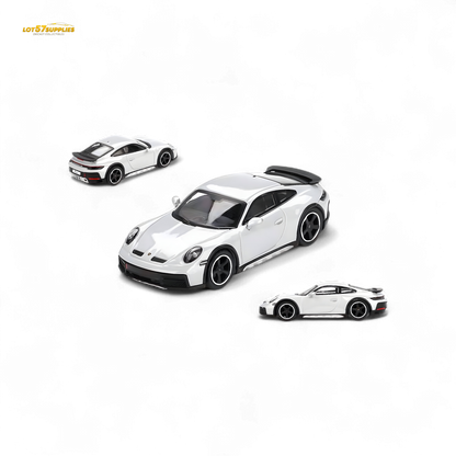 Mini-GT Porsche 911 Dakar diecast model in ice gray metallic, 1:64 scale, showcasing detailed design and sporty features.