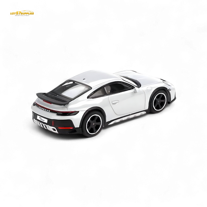Mini-GT Porsche 911 Dakar diecast model in Ice Gray Metallic, 1:64 scale, detailed toy car for collectors