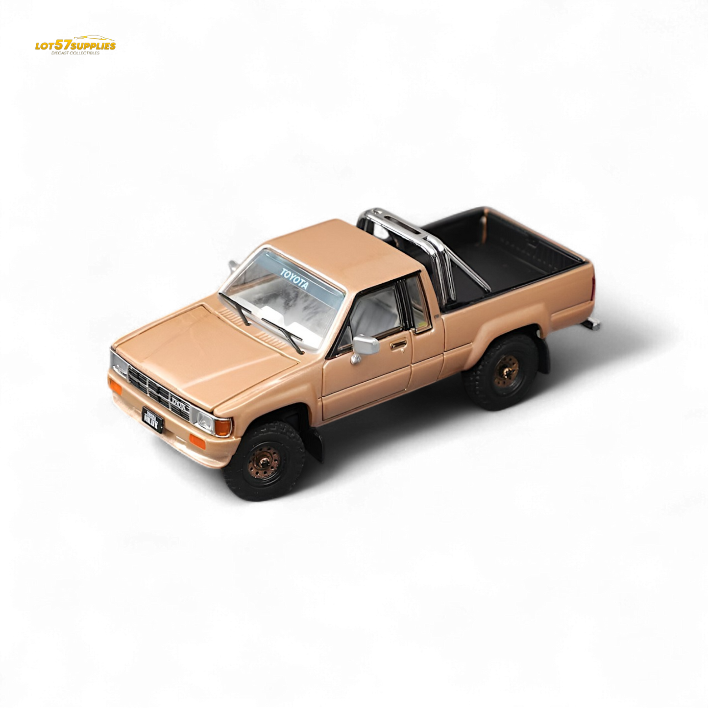 Gold Toyota Hilux SR5 diecast model in 1:64 scale by Lot57Supplies Diecast Shop, detailed view of the miniature vehicle.