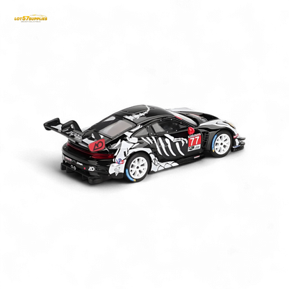MiniGT Porsche 911 GT3 R Skeleton diecast car in 1:64 scale, detailed model with skeleton design, black and orange accents.