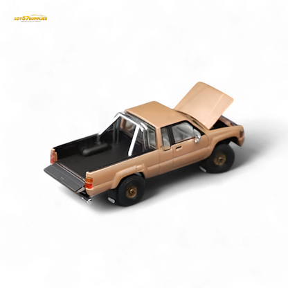 Gold Toyota Hilux SR5 diecast model in 1:64 scale by Lot57Supplies Diecast Shop, detailed miniature vehicle for collectors.