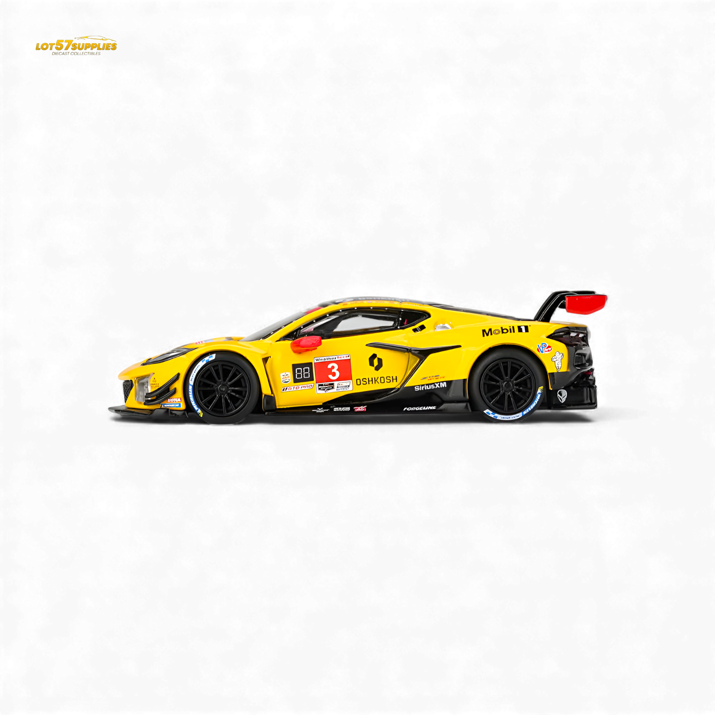Mini-GT Chevrolet Corvette Z06 GT3.R diecast model in 1:64 scale, detailed black and yellow racing car, front view.