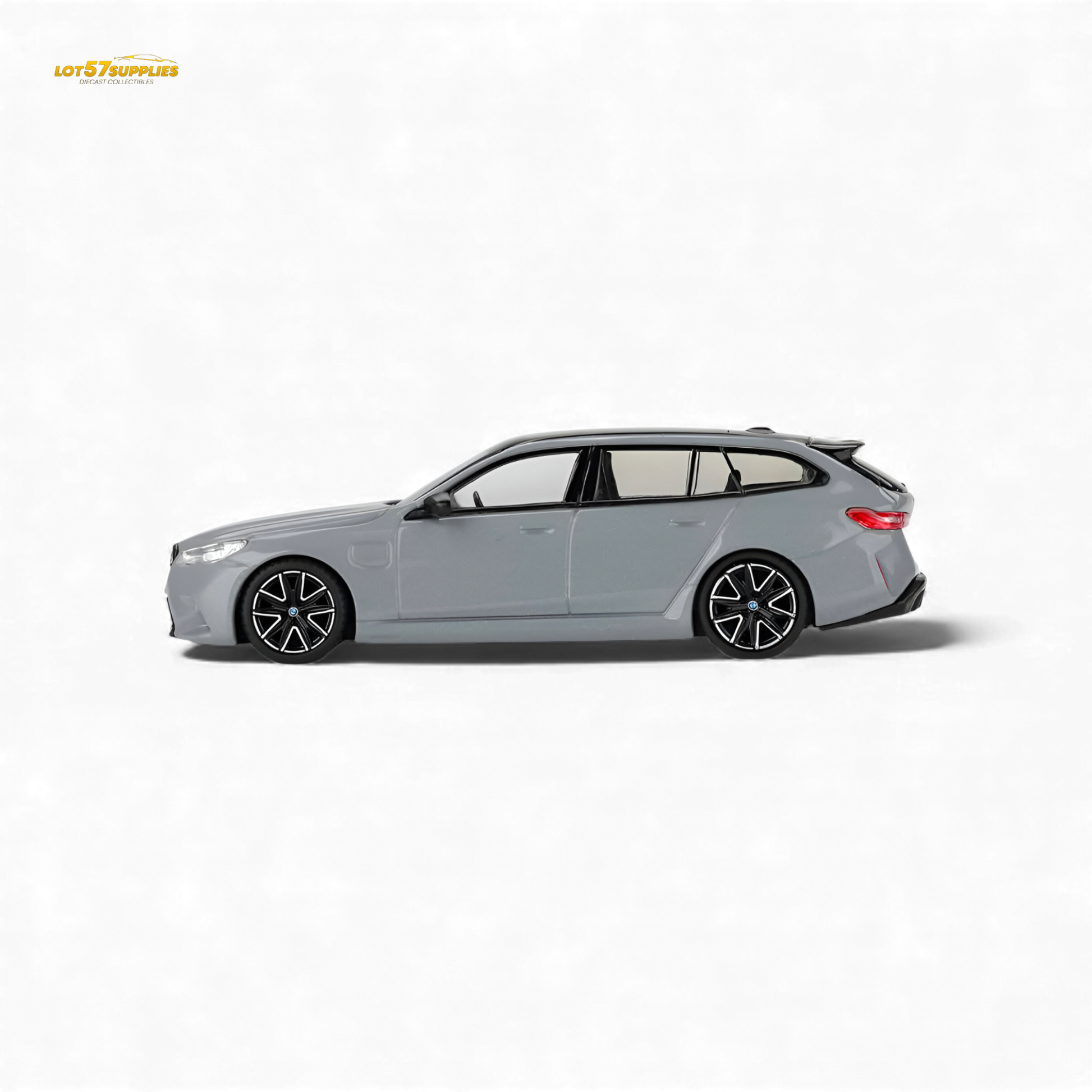 Mini GT BMW M5 Touring diecast model in Brooklyn Grey Metallic, 1:64 scale, detailed BMW car replica.