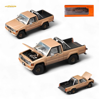 Gold Toyota Hilux SR5 diecast model in 1:64 scale by Lot57Supplies Diecast Shop, detailed toy car with realistic features.