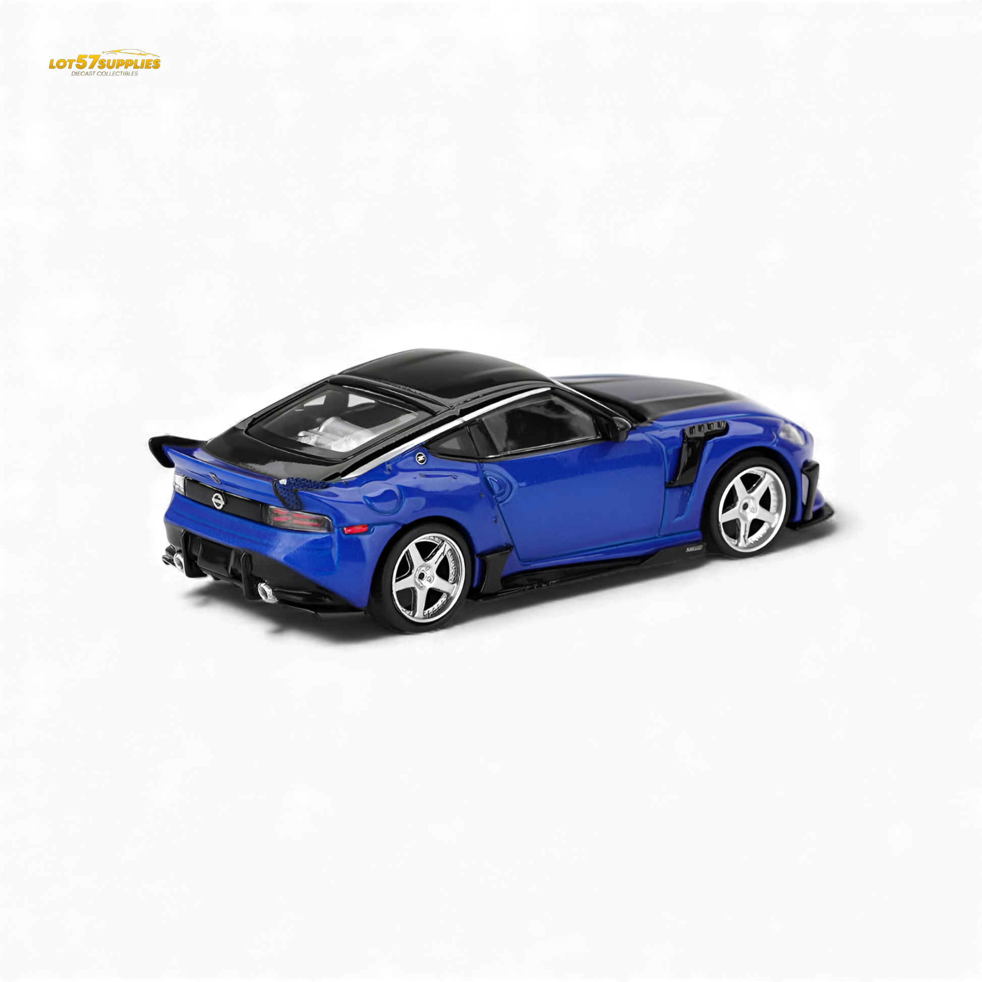 Mini GT Nissan Z VeilSide FFZ400 diecast model in Seiran Blue, 1:64 scale, featuring detailed exterior design.