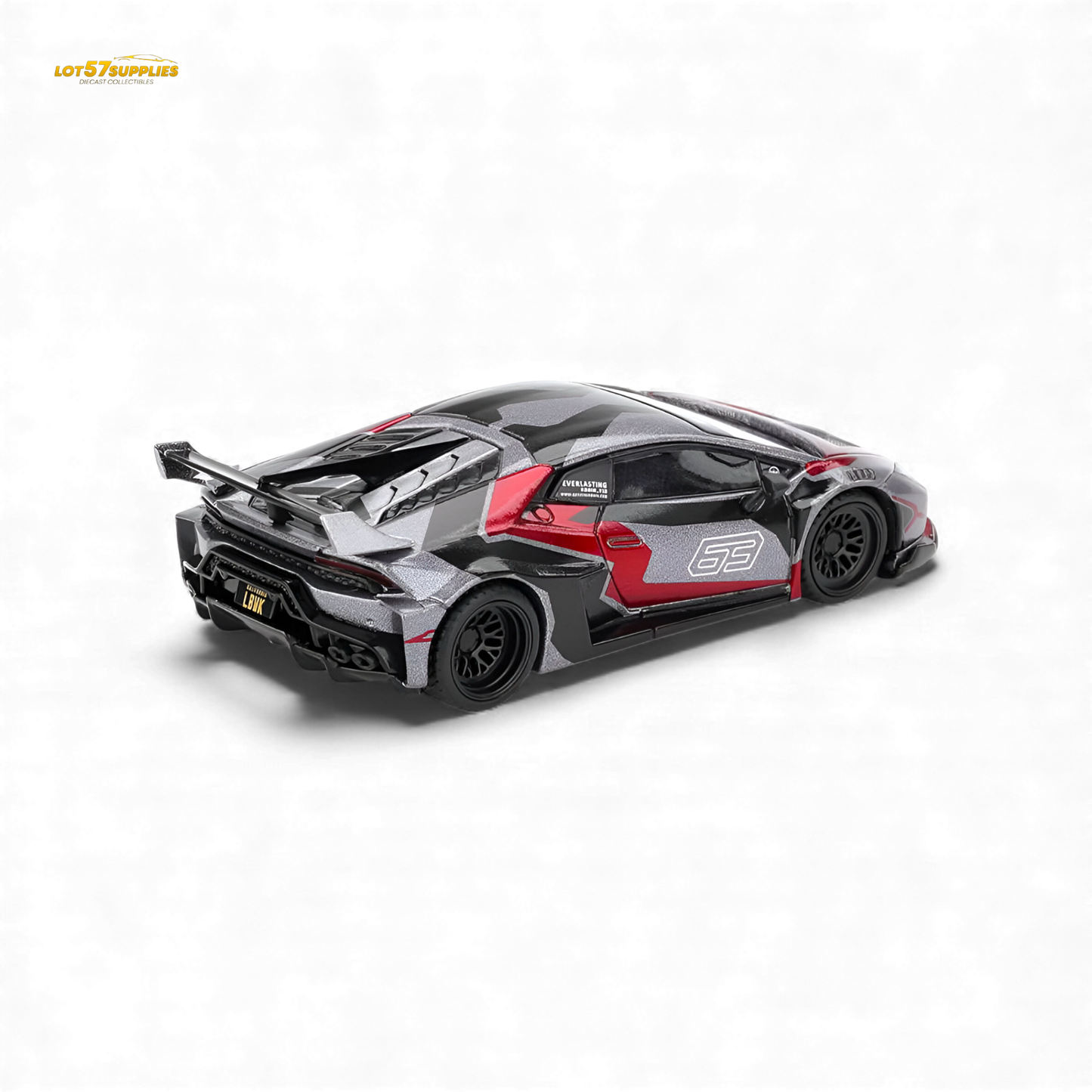 Mini GT Lamborghini Huracan GT RONIN diecast model in 1:64 scale, detailed yellow Lamborghini car with black accents.