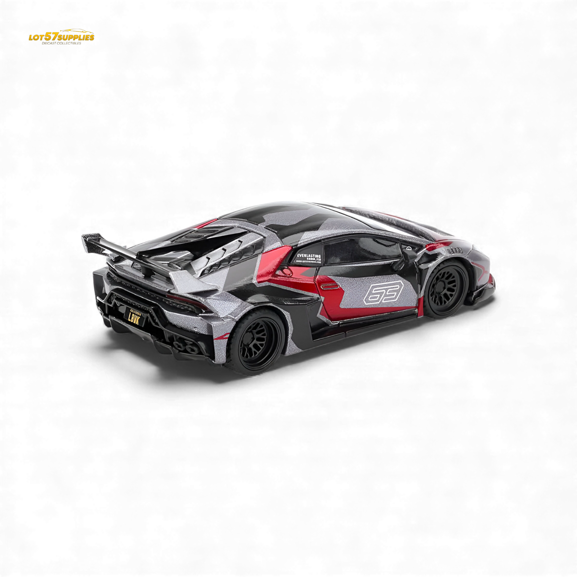 Mini GT Lamborghini Huracan GT RONIN diecast model in 1:64 scale, detailed yellow Lamborghini car with black accents.